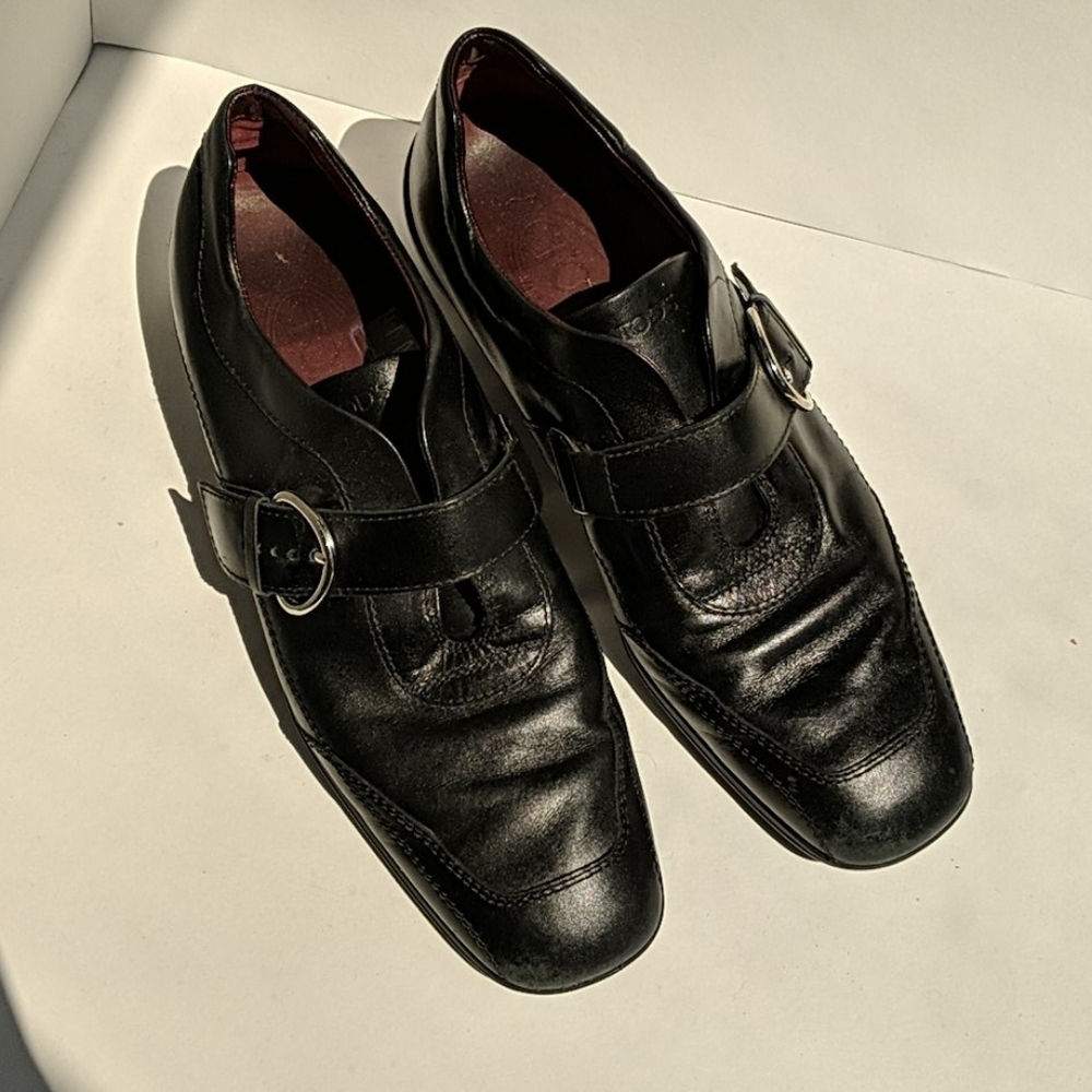 Black Tod's buckle loafers